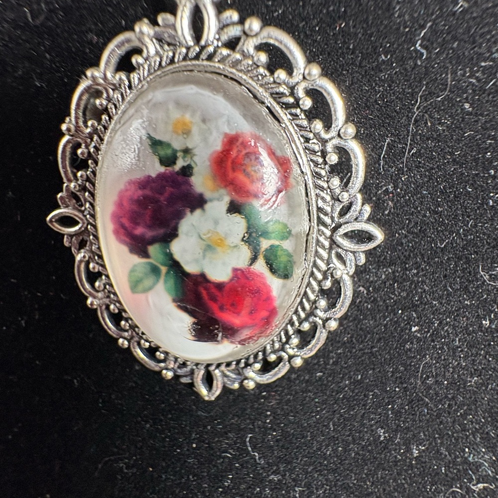 Elegant Silver Floral Brooch